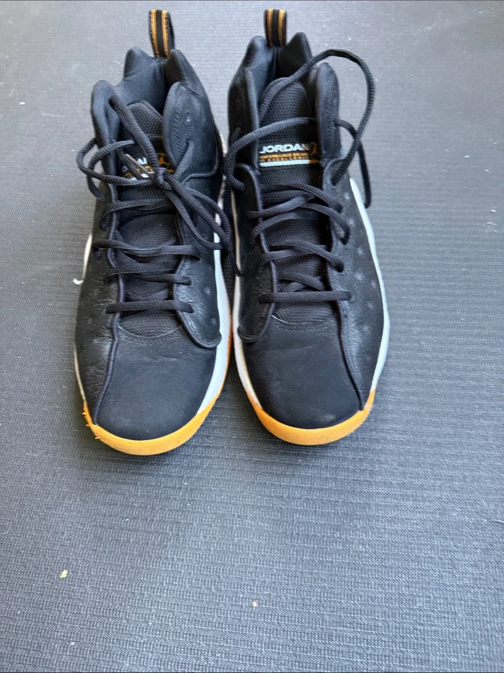 Jordan Men’s Black and Orange High-Top Sneakers